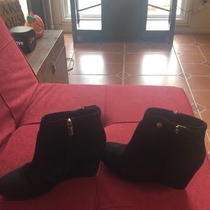 Tory Burch black suede wedges boots.